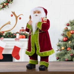 Northlight 24" Red And Bright Green Standing Santa With Presents Christmas Figure -Christmas Decor Sale northlight e76438 styled 46888.1671008536